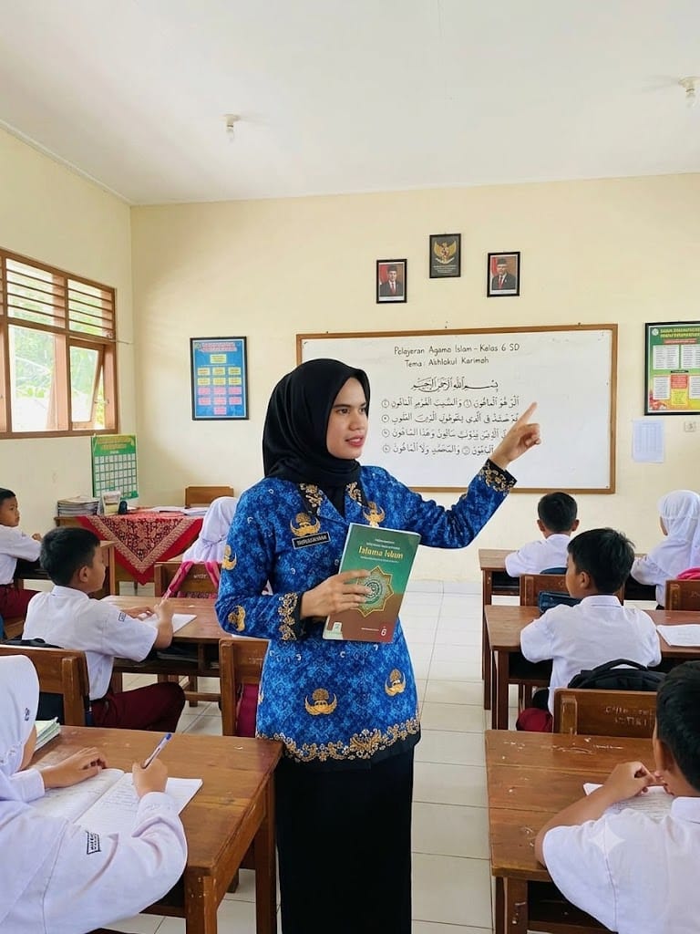 Yuni Sarah Naiggolan, S.Pd