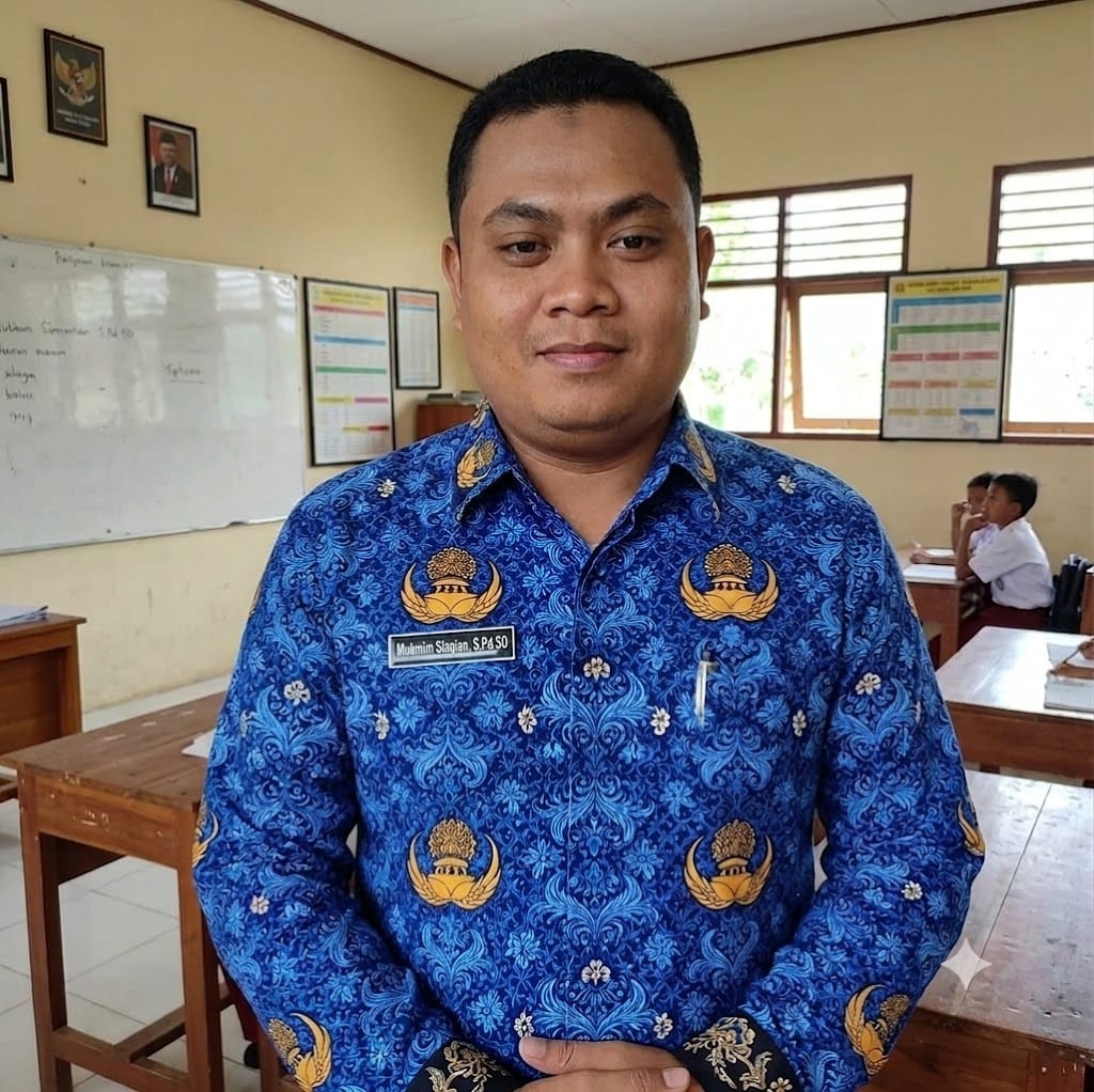 Mukmin Siagian, S.Pd